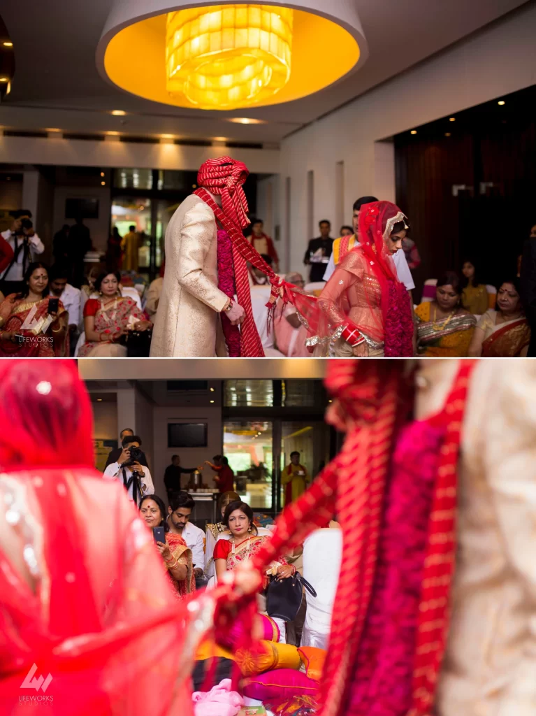 An image portraying the bride and groom taking the pheras (circling the sacred fire) during the wedding ceremony, symbolizing the sacred vows and commitment as they embark on their marital journey.