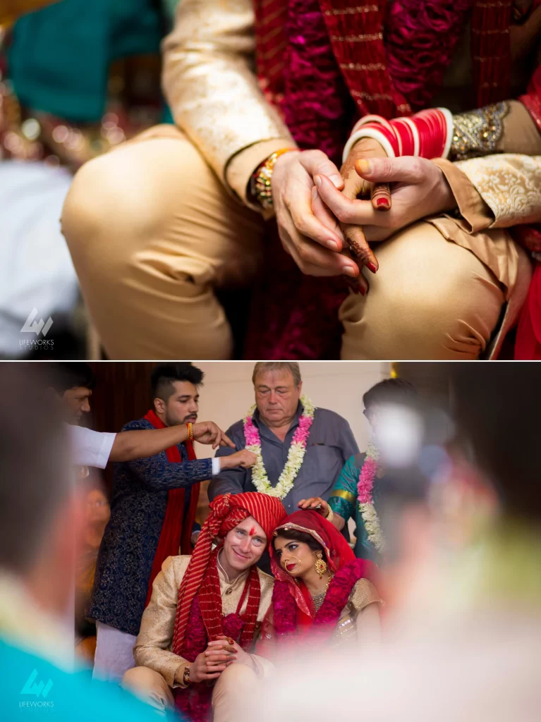 An image capturing the bride and groom standing hand in hand, radiating happiness and joy, symbolizing the love and unity shared between the newlyweds on their special day.