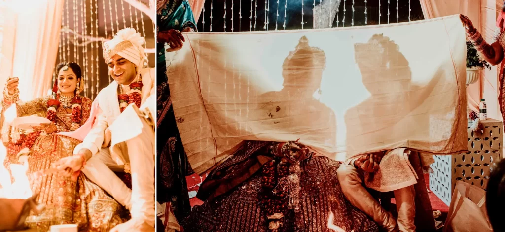 A couple taking part in a traditional wedding puja at the mandap, in the midst of sacred rituals and auspicious ceremonies, surrounded by family and religious officiants.