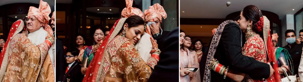 A emotionally touching moment capturing the bride's emotional bidai ceremony as she departs from her family home, surrounded by loved ones, during her traditional Indian wedding