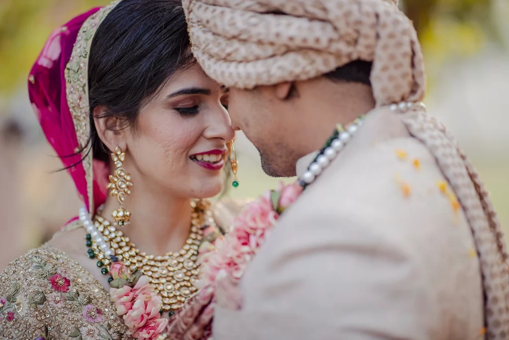 Newlyweds exude joy in a post-wedding photoshoot, capturing their love and happiness in a beautiful and candid setting.