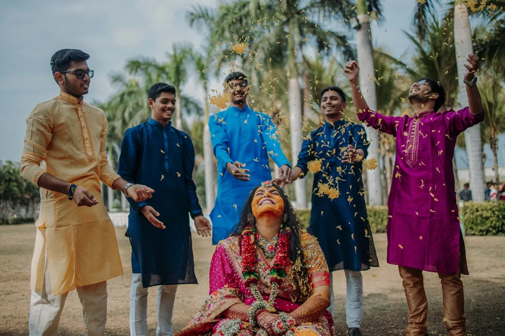 Beautiful haldi ceremony attire and colorful decor accompanied by joyful haldi songs