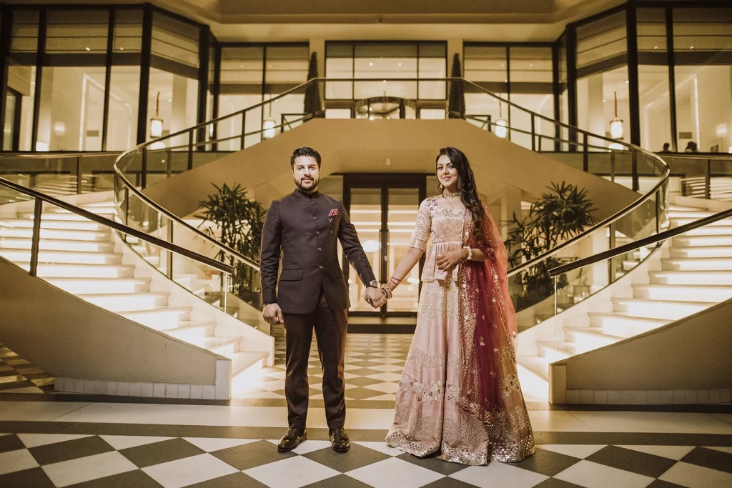 Beautiful couple captured in a romantic moment at The Oberoi, Delhi, during their destination wedding photoshoot