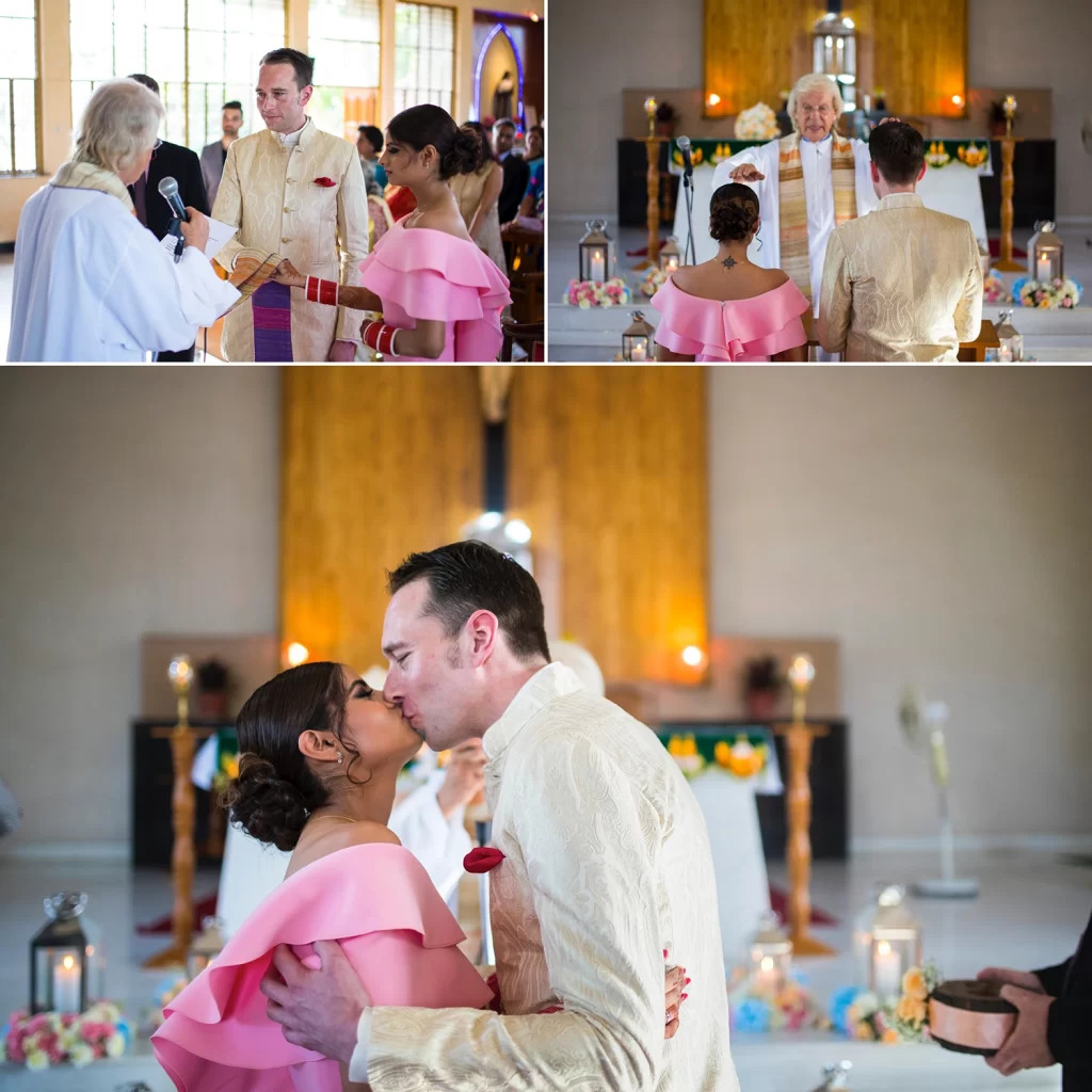 The bride and groom sharing a tender kiss during their Christian wedding ceremony in a picturesque church setting, surrounded by symbolic rituals and blessings