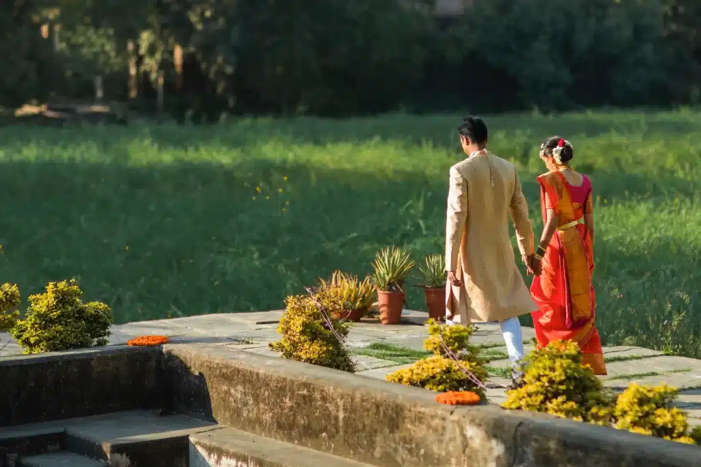 "Romantic couple posing for a photograph at Deo Bhag, Neemrana in Gwalior, perfect for a destination wedding celebration."  