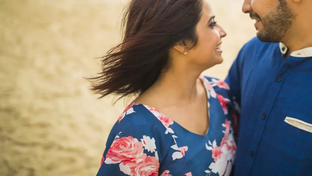 Playful moments captured on the sandy shores of Goa during a pre-wedding shoot.