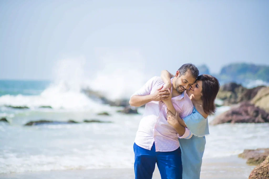 Playful moments captured on the sandy shores of Goa during a pre-wedding shoot.