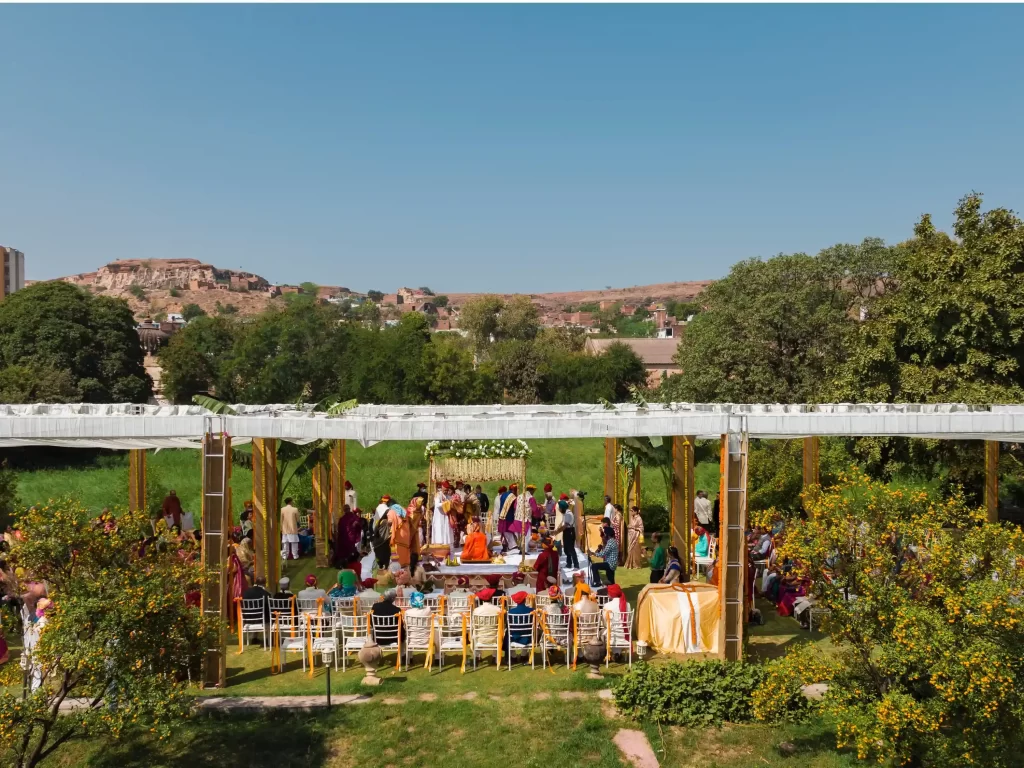 Drone shot of Neemrana Fort illuminated beautifully for a romantic destination wedding under the sky.