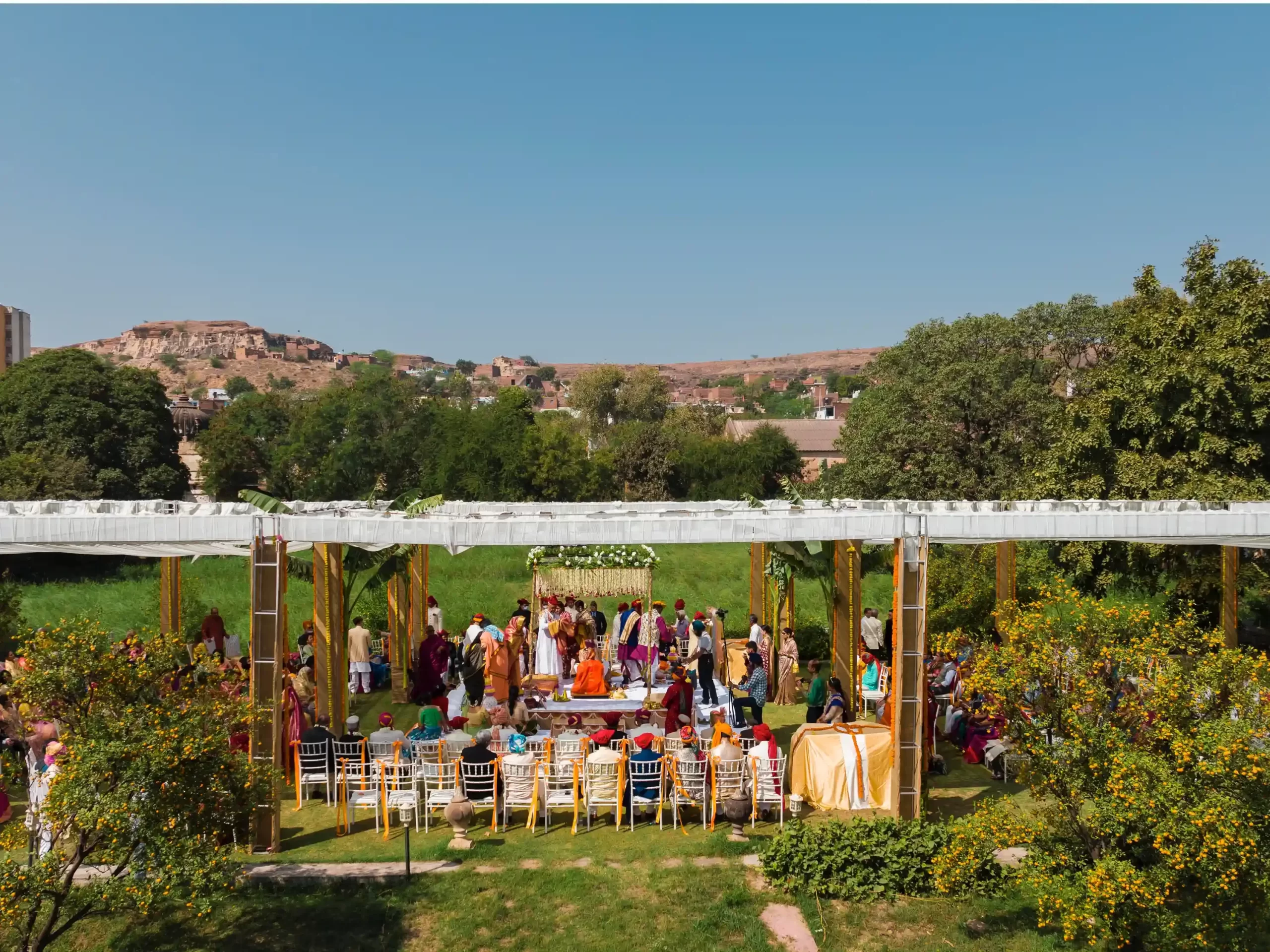 Drone shot of Neemrana Fort showcasing beautifully for a romantic destination wedding under the sky.