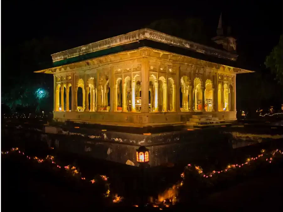 Wide-angle shot showcasing the breathtaking architecture of Neemrana Fort as a backdrop for a destination wedding celebration.