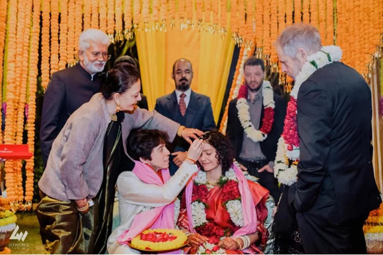 In a heartfelt moment during the Hindu wedding in Dubai, the groom applies sindoor to the bride's forehead, symbolizing marriage.