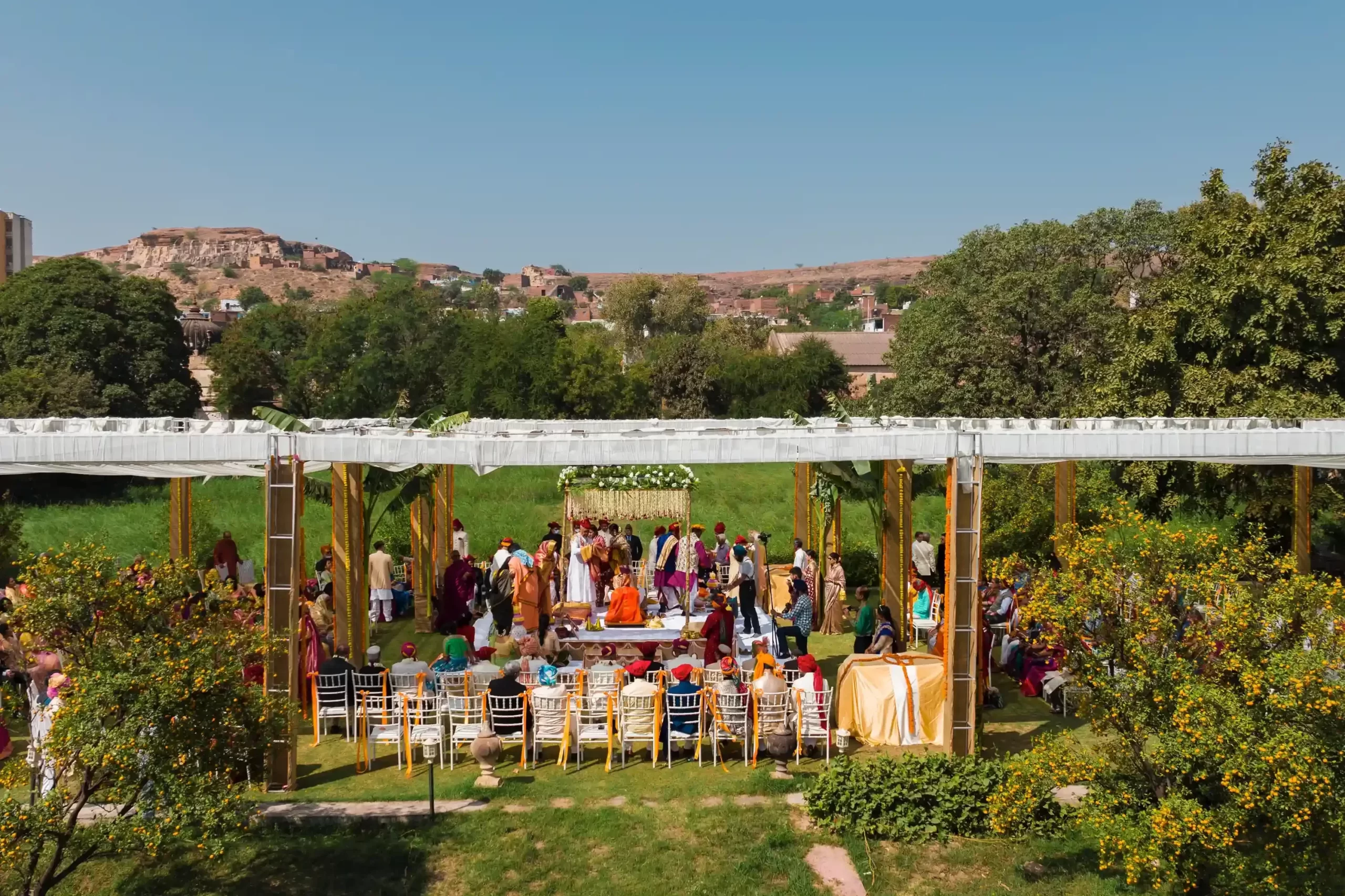 Drone shot of Neemrana Fort illuminated beautifully for a romantic destination wedding under the sky.