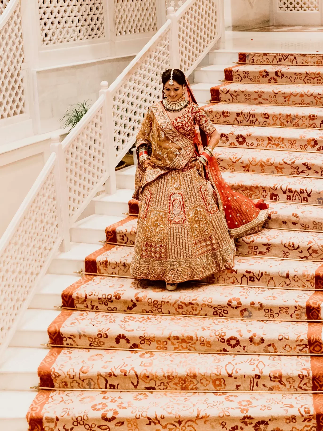 Bride's stunning dress flowing, captured in detail in elegant wedding photography in Dubai on her special day.